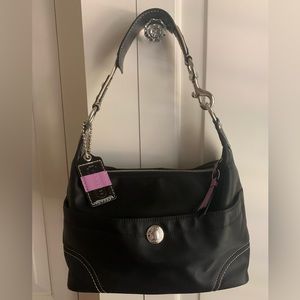Coach F11668 black nylon shoulder bag with zippered top and lavender zipper pull